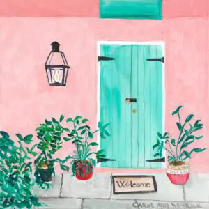 Bright teal door on a pink wall with plants and a welcome sign.